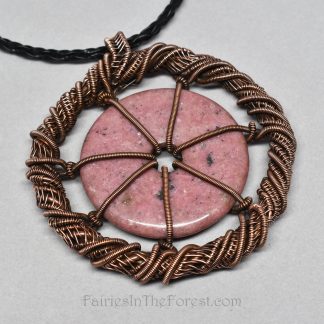 Copper and Rhodonite gemstone donut necklace.