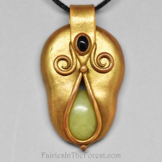 Gold polymer clay pendant with green serpentine and black onyx.