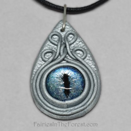 Blue dragon eye in silver polymer clay necklace.