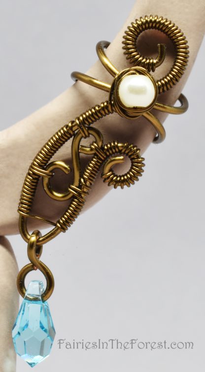 Vintage brass and blue Swarovski crystal fairy style handmade ear cuff.