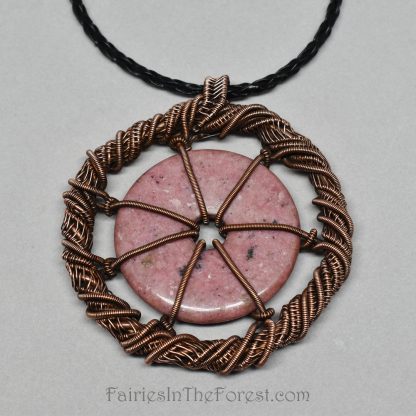 Copper and Rhodonite gemstone donut necklace.