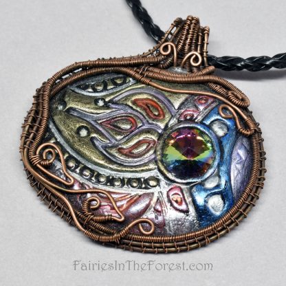 Polymer clay and copper wire wrapped necklace.