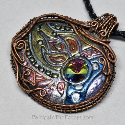 Polymer clay and copper wire wrapped necklace.