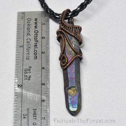 Copper wire wrapped titanium Quartz pendant.